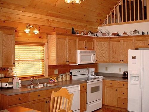 Чем отделать потолок на кухне, варианты отделки: вагонка, дерево, пвх панели