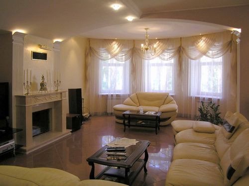 Декоративный камин в квартире (74 фото): имитация электрокамина в интерьере, фальш-камин для городской квартиры