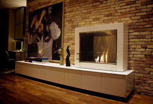 Декоративный камин в квартире (74 фото): имитация электрокамина в интерьере, фальш-камин для городской квартиры