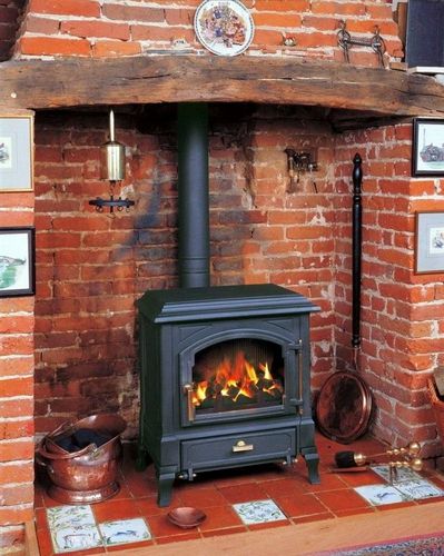 Чугунные камины (70 фото): дровяная печь длительного горения для дачи и загородного дома