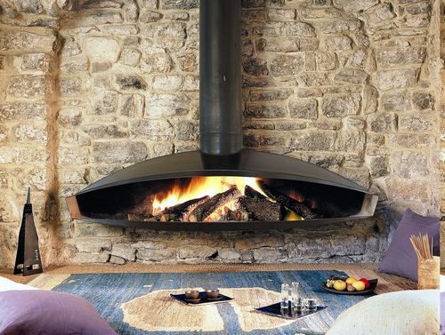 Чугунные камины (70 фото): дровяная печь длительного горения для дачи и загородного дома