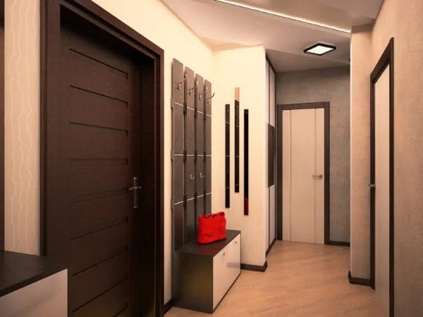 светлый дизайн коридора с темными дверными проёмами в квартире 