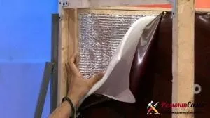 Для повышения эффективности утепления поверх поролона фольгированной стороной укладывается изолон