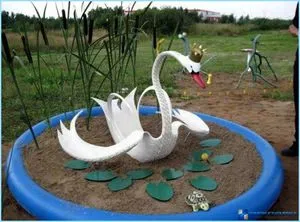 Красивый лебедь из покрышки