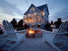 Bring the beach to your backyard with a sand and stone fire pit. Sand Fire Pits, Beach Houses For Rent, Dream Beach Houses, House On The Beach, House Near The Sea, Interior Exterior, House Exterior, Hamptons Exterior