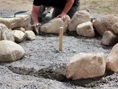 How to Create a Fieldstone and Sand Fire Pit Area | how-tos | DIY Metal Fire Pit